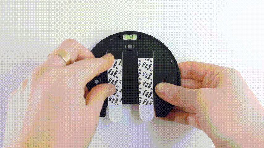 Remove sticky tape from base of Poplight